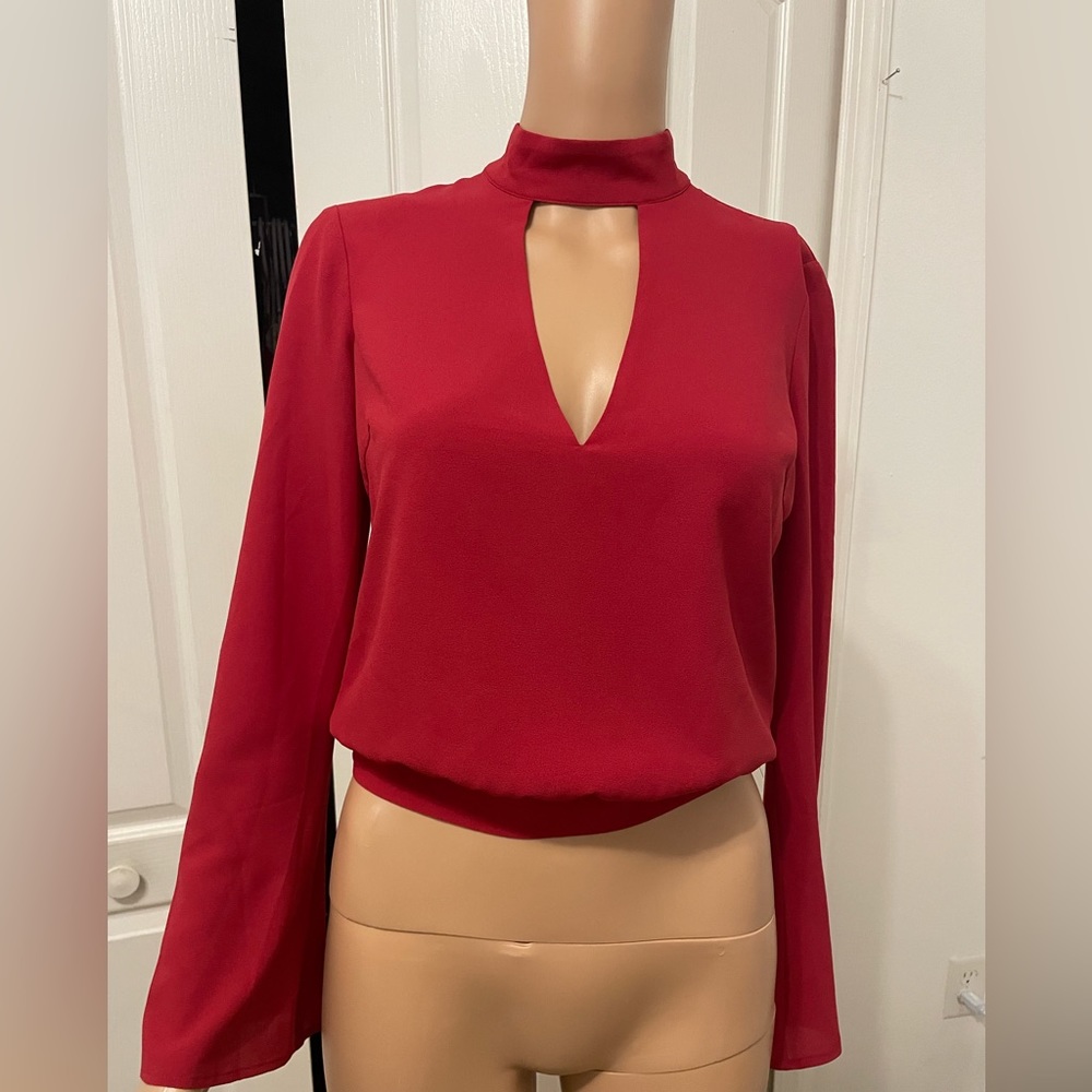 Bebe cutout long sleeve blouse XXS